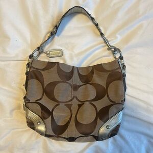 Coach Carly Signature Canvas Hobo Bag in Brown and silver